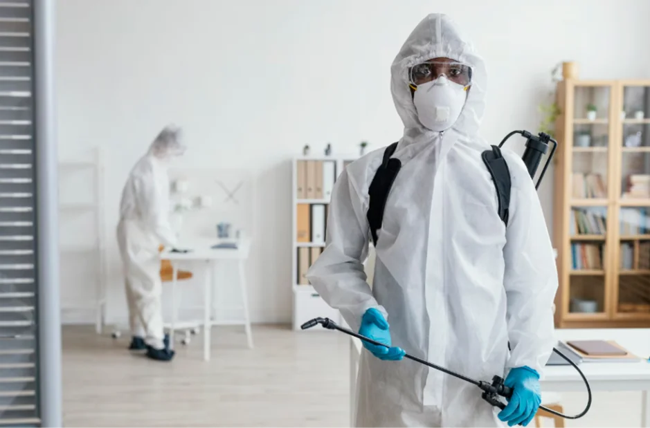 Pest control services technician inspecting home for pests